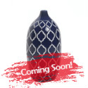 Spellbinding pattern and timeless style is what this deep blue vase is all about! The ceramic vase is carved with an exotic and entrancing white repeating pattern that is contemporary and classic all at once. Alone or with a bouquet of your favorite flowers, this is a must-have decor accent for your room.