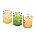 Add candles to this trio of brightly colored candle cups and be refreshed by the glow. Three candle cups feature patterned glass and scalloped edges in shades of lemon, orange, and lime.