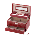 Looking for a jewelry box that's as beautiful as the jewelry inside? This is it! This large multi-level box is finished in glossy deep red faux snakeskin and features a matching top handle and a bold metallic clasp at the front.