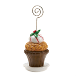 Welcome guests to your holiday table with this sweet cupcake place card holder. The decorative cupcake is frosted and topped with mistletoe, and a metal holder rises from the middle. It can also be used to display holiday cards!