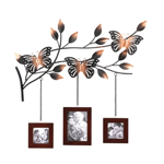 The most lovely way to display three of your favorite family photos! A trio of wood picture frames hang from a metallic branch blooming with leaves and home to three gorgeously detailed butterflies. 