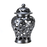 The perfect finishing touch to your decor, this lovely ceramic decorative jar features paisley-shaped cutouts and a fluted lid. It will enhance your tabletop or mantel with designer style!