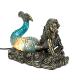 Get swept away by the alluring glow of this beautiful mermaid lamp. She rests on top of curling waves and her tail lights up with ocean-blue glow.