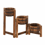 Roll out the barrels and a dollop of country charm! The simualted fir wood barrels of this planter trio have authentic metal banding and are fastened to sturdy wood posts. Its hinged tri-level design gives you the freedom to adjust it to fit anywhere in your yard. Fir wood. 