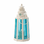 Indoors or out, the ocean-blue glass and white metal of this lighthouse lantern is a cheerful coastal accent in your home. Open the door to place a candle inside to soak in the cheery radiance. Iron and glass. Candle not included. 