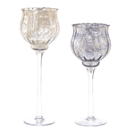 Fill this dazzling chalice with the candle of your choice and delight in the dancing glow of the flame from behind the golden speckled design. This tall chalice will help you set the scene for a romantic dinner or cozy night.