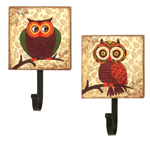 Who wants to leave their coat or bag on the floor? Who? Not you! These darling wall-mounted metal hooks are highlighted by a wooden plaque that's decorated with a charming retro-inspired owl. 