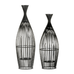 Candlelight has never been more intriguing than when shining from this stunning wire-frame vase. The interior holds a glass candle cup that awaits the candle of your choice. Iron and glass. Candle not included.