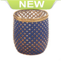 Glittering diamonds of light will enchant your room when you light a candle inside this exotic glass holder. Trimmed with golden metal, this patterned candle cup is the key to refined style and worldly flair.