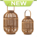 The natural style of this earthy bamboo candle lantern will breathe new life into your living space. Behind the fine mesh panel rests a clear hurricane glass that will protect the flame of your favorite candle. Set it down or hang it from the oversized handle. Bamboo, MDF Wood, & Glass.