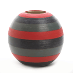 If you’re looking for a bold accessory that will put the perfect finishing pop of color and pattern in your room, you’ve come to the right place! The Safari Round Vase features brilliant red, deep gray, and thick black stripes that make it a standout. Display your favorite faux blooms or reeds or simply leave it solo; either way, it will lend an exotic flair to your décor.