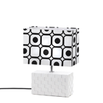 This lamp is the perfect blend of modern and retro style! The textured ceramic white base is topped with a mod “pop art” shade with black graphics.