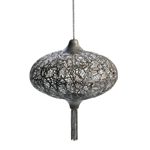 Wavy designs in burnished metal make for an exotic lighting accent that will add intrigue and fascinating design to any corner of your room. The top and bottom of this candle lantern features bell-shaped accents. The lantern hangs from a singular chain and the bottom features a collection of chain accents.