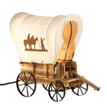 Follow the wagon trail to discover the most charming lamp on the prairie. This tabletop wooden wagon lamp features metal wheels and a wagon cover with silhouettes of cowboys and horses.