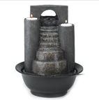 Fire and water combine to form one spectacular decoration! Cascades of water trickle down faux-stone steps, while tealights glimmer from atop twin pillars. A tabletop fountain to treasure!