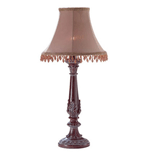 Lovely lamp’s shade is bedazzled with gleaming amber beads, lending a room the subtle shimmer of Moroccan mystique. 