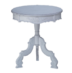 Exquisitely carved flourishes add an air of refinement to this appealing accent table. A decorative addition to any room! 