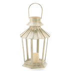 Intriguing five-sided lantern features tapered shape, weathered ivory finish and graceful fluted roof. Generously sized to hold a stately pillar candle for plenty of cheerful candlelight.