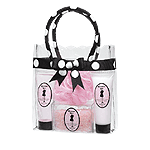 This glamorous polka-dot bag filled with exotic 4.6 fl. oz. lotions and gels and a variety of other bathing accoutrements is a testament to the French gift for luxury.