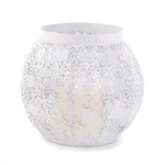 This rounded candle holder features an intricate design that casts fascinating patterns of candlelight and shadow. Add a candle of your choice inside and bask in the sophisticated glow!