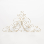 Beautifully curled iron rods, covered in a vintage white hue, bend and flourish with timeless style to create a stunning candle wall sconce. With five platforms for the candles of your choice, you can hang this pretty accent on your wall and it will light up the whole room with style even when the candles arent lit. 