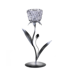 This gorgeous diamond-pattern smoked glass candle cup will multiply and magnify the shimmering light from a lone candle. The silvery stem, leaves and circular base make this candleholder bloom with undeniable beauty.