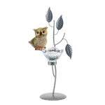 The cutest little owl in all the forest sits perched upon the branches of this charming candle holder. A flower-inspired candle cup will shimmer when you add a candle of your choice inside, and the silvery leaves and branches are the perfect finishing touch. 