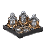 Invite peace and serenity into your home and remind everyone to speak no evil, hear no evil, and see no evil. The wooden frame of this serenity garden is filled with polished stones, two clear glass candle cups, and three charming Buddha statues.