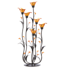 Slender curving stems support iridescent amber lily blossoms, creating an elegant play of form and color. Place a candle into each bloom to enhance the night with dazzling light!