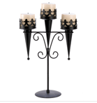 As a fascinating focus piece or a dramatic décor accent, this stately stand creates a lasting impression! Deep black finish accentuates every shapely detail and creates stunning contrast to a triple candle flame.