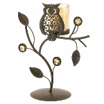 With its fanciful theme and its rich, earthy colors, this vine shaped candle stand is a wise decorating choice indeed! Cute owl ornament is ever so enchanting when backlit by a candle’s glow.