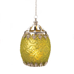 Bring the fruits of luxurious design into your home with this candle lantern. The deep citrus color ensconced by appealing silver-toned filigree will make this piece a standout anywhere it is placed. Light a candle inside and watch as beautiful patterns flicker across the room.