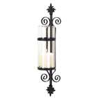 A palatial touch of Tuscan elegance adds old-world beauty to your home! Ornate matte-black forms a dramatic backdrop for a crystal-clear column of glass. Simply add your favorite color pillar candle for instant decorating magic!