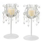 Delicate crystal drops dangle from sleek ivory-finished wrought iron candle stands, catching each nuance of candlelight. The essence of elegance!