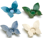 Enjoy the summertime beauty of a magical butterfly for all eternity with this candleholder. A delicately detailed butterfly spreads its wings to create the perfect space for the candle of your choice.