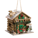 Give the birds a holiday retreat where theyll be able to spend quality time with their family. This log cabin features greenery trim, holiday wreathes, and a friendly snowman out front. 