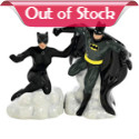 The Bat and the Cat. From the DC Comics collection, these ceramic Batman and Catwoman Salt and Pepper Shakers stand about 4-inches tall and link together via magnets. The Caped Crusader and the Feline Fatale are featured in action poses with excellent detail in the ebb of Batman's cape and the curve of Catwoman's figure. Wouldn't they look just purr-fect in your kitchen? 