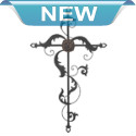 This beautiful iron wall cross features delicate design mated to a strong framework. The flourishes and central flower are a pretty way to decorate your space with love, faith and style. 