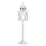 What bird can resist this romantic gazebo birdhouse? Its weathered white finish, scalloped roof shingles, and delicate window boxes filled with faux flowers make this pavilion a lovely place for your feathered friends to gather this summer.