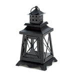 A constant vigil to great design, our Watch Tower Candle Lantern will shine like a beacon inside or out. The black metal frame features a cupola with an oversized hanging loop at top and classic lighthouse-inspired accents. Place the candle of your choice inside and enjoy the glow!