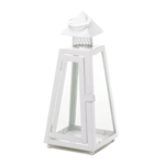 This stunning iron candle lantern shows off the architectural detailing, and the clear glass panels will let the light from your favorite candle shine bright.