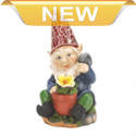 Heres a happy gardener whos ready to add some cheery light to your yard. This adorable gnome is proudly tending to his yellow bloom, and his red hat will shine bright at night thanks to the statues solar panel. 