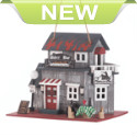 The birds in your yard will love making this Route 66 biker bar their home! This whimsical birdhouse features all the trimmings of a smokin hot highway roadhouse, complete with a motorcycle parked outside and a flame-painted roof. Clean out hole on back. 