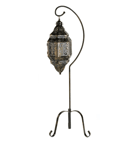 Capture the drama of a deep desert night with this enchanting standing lamp! Free-swinging lattice lantern cage lets candlelight create shifting designs that dazzle and delight.