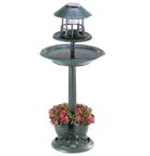 Fantastic three-in-one decoration adds liveliness to any garden! Lightweight yet sturdy enough for years of enjoyment, this faux-metal treasure brings together a generous birdbath, a solar night light, and a place for four of your favorite plants.