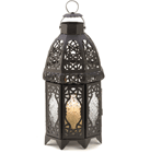 Magical patterns haunt the night, cast by the intricate panels of this stunning Moroccan marketplace lantern. Adds an instant touch of the exotic to everyday life!