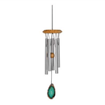 Shining chimes weave a gentle breeze into a magical musical spell! Beautifully crafted with natural wood and geode trim, with silver anodized aluminum pipes that sparkle the air with song. 