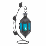 At the end of a graceful vine hangs a lantern of purest blue, blazing with color from a petite candle tucked inside. This freestanding lamp makes a stunning appearance no matter where you choose to enjoy it!