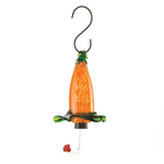 Hummingbirds are drawn to the flowering beauty of this hand blown glass feeder, and who can blame them? The delicate splendor of this exquisite feeder holds plenty of nectar to attract lovely hummingbirds to buzz back to your yard again and again.