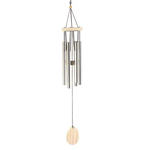 The grandeur of nature’s bounty surrounds you, and this windchime accents that simple beauty without fanciful frills. Graceful silver-tone pipe chimes await the movement of the breeze along with an oblong disc that sways from the metal clapper.